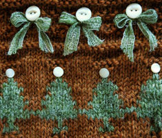 Detail shot from one of fireflys hand knit Christmas Stocking designs